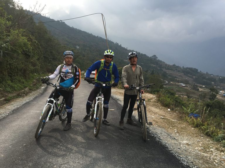In centre - Yonten with other amidst Bike Trip