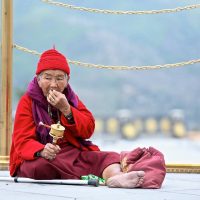 Old women with prayers wheels in Paro Windhorse Tours