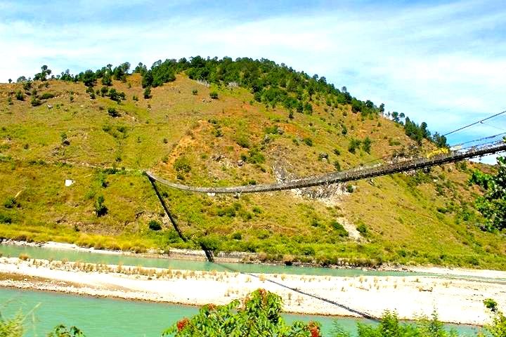 Best time for trekking in Bhutan 4 Windhorse Tours Winter Trek - Samtegang - A long suspension bridge over Pho chhu river connecting Shanghana village with Punakha (January 2015)