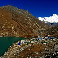 Gokyo 3rd Lake and Gokyo village above the Gokyo lake is Gokyo Ri down the far right hand corner is Cho Oyu Mountain. Windhorse Tours